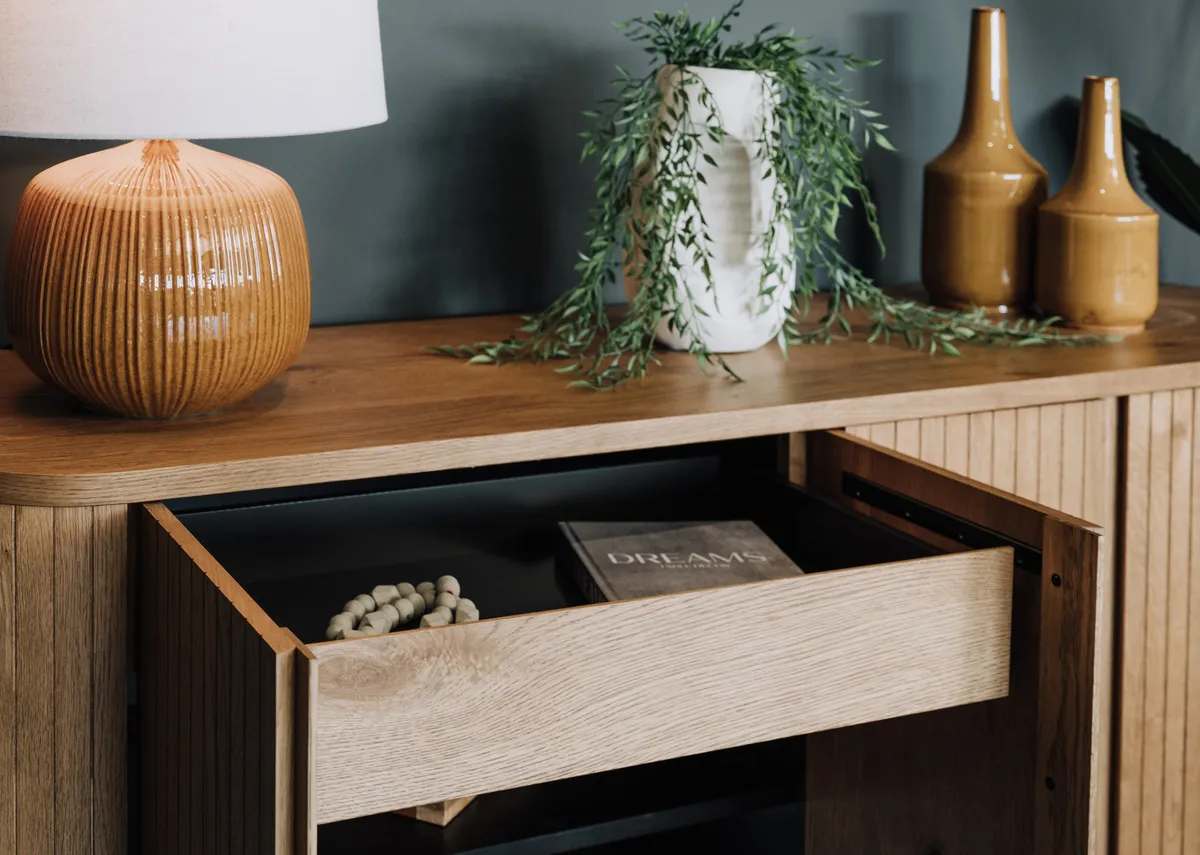 A wide rustic oak sideboard with panel finish from EZ Livings Vega range. Closeup of panel finish