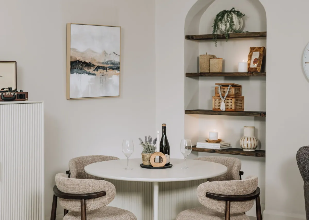 A lifestyle image of the Misty 1 picture with the Palma round table