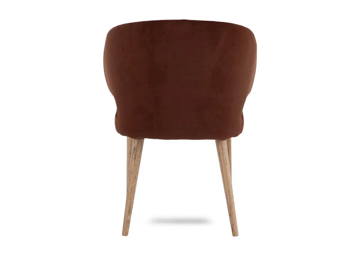 A bronze fabric dining chair from EZ Livings Victor range. Back view of rustick oak legs and curved seat