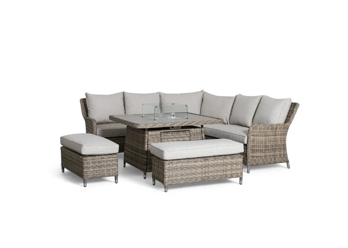 A grey corner woven garden set with glass top table and 2 rectangular ottomans from EZ Livings Monterey range. Angled view