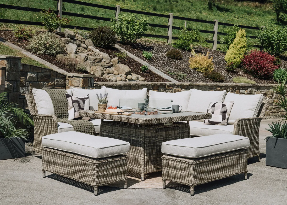 A lifestyle image of the Monterey ceramic garden table with firepit ready to use