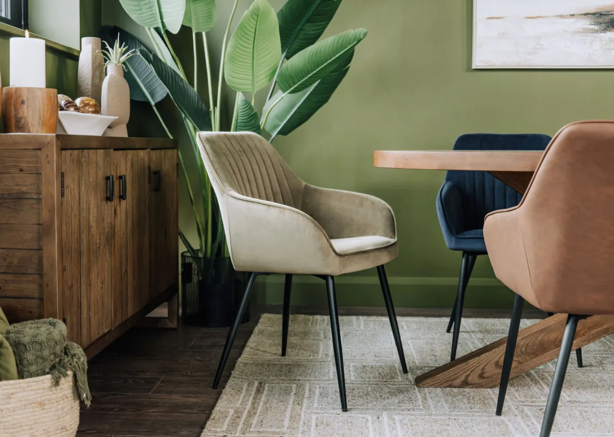 A lifetsyle image of the Nolan green dining chair with the Oslo table