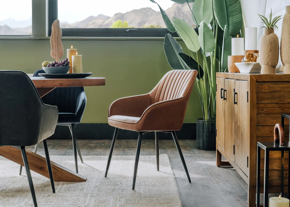 A lifetsyle image of the Nolan tan dining chair with the Oslo table