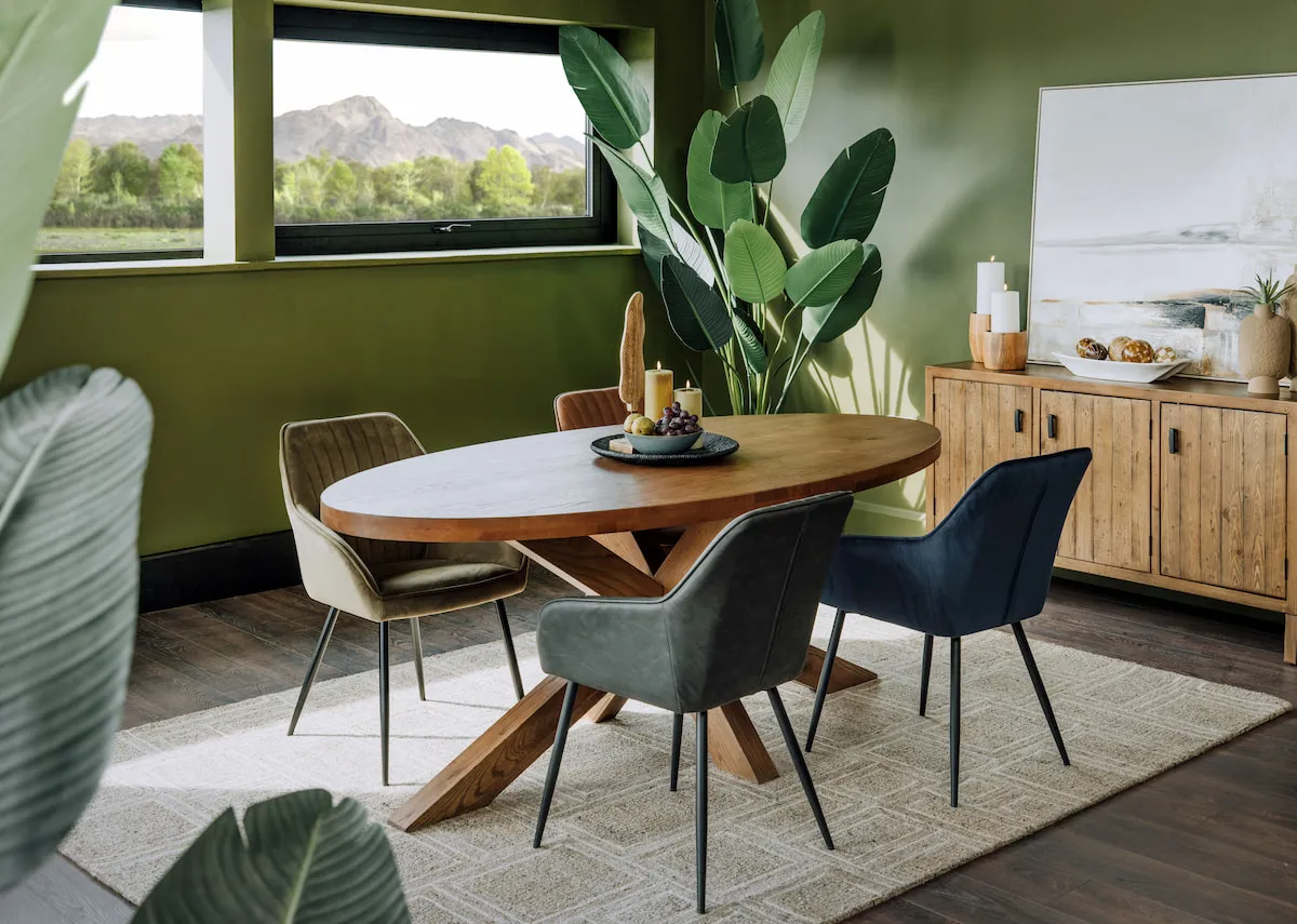A lifestyle image of the Nolan chais with the Oslo oval table and Ladder sideboard