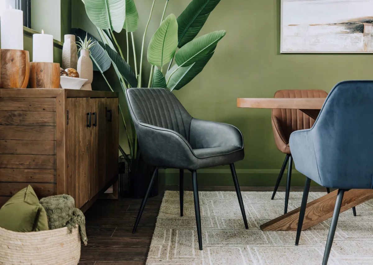 A lifestyle image of the Nolan chair in vintage grey with the Oslo table.