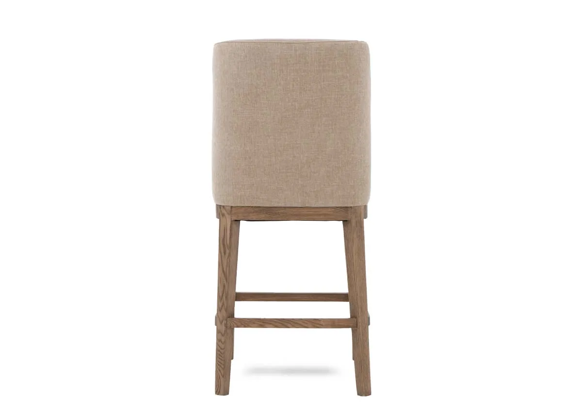A natural oak counter stool from EZ Livings Naxos range. Back view of fully covered seat
