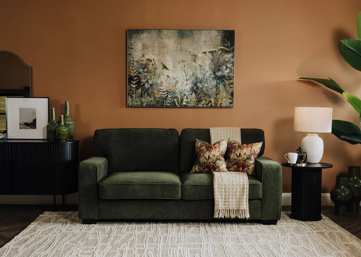 A lifestyle image of the Nevada sofabed in a sofa position with Fanciful print and Raleigh rug