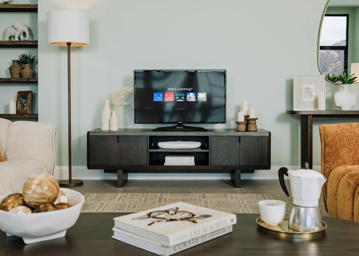 A lifestyle image of the Rimini TV Unit withMemphis rug