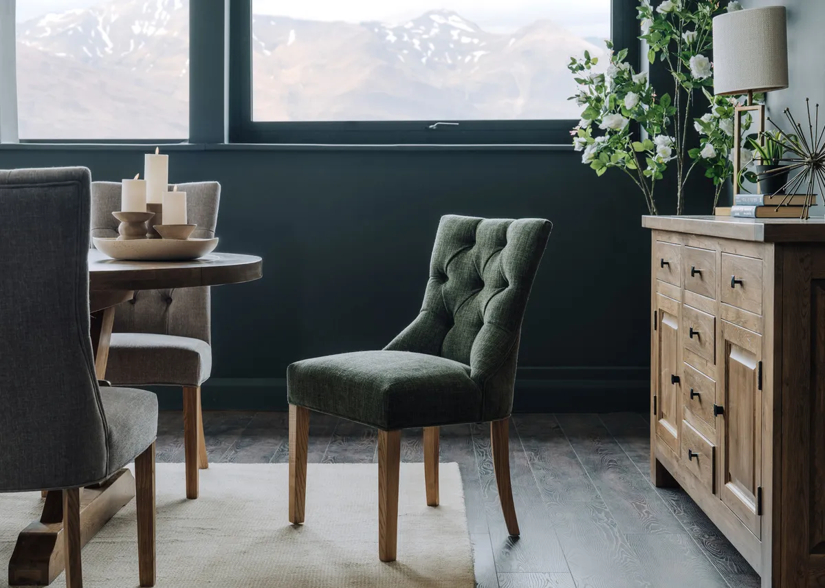 A lifestyle image of the Felix dining chair with Naxos sideboard and dining table