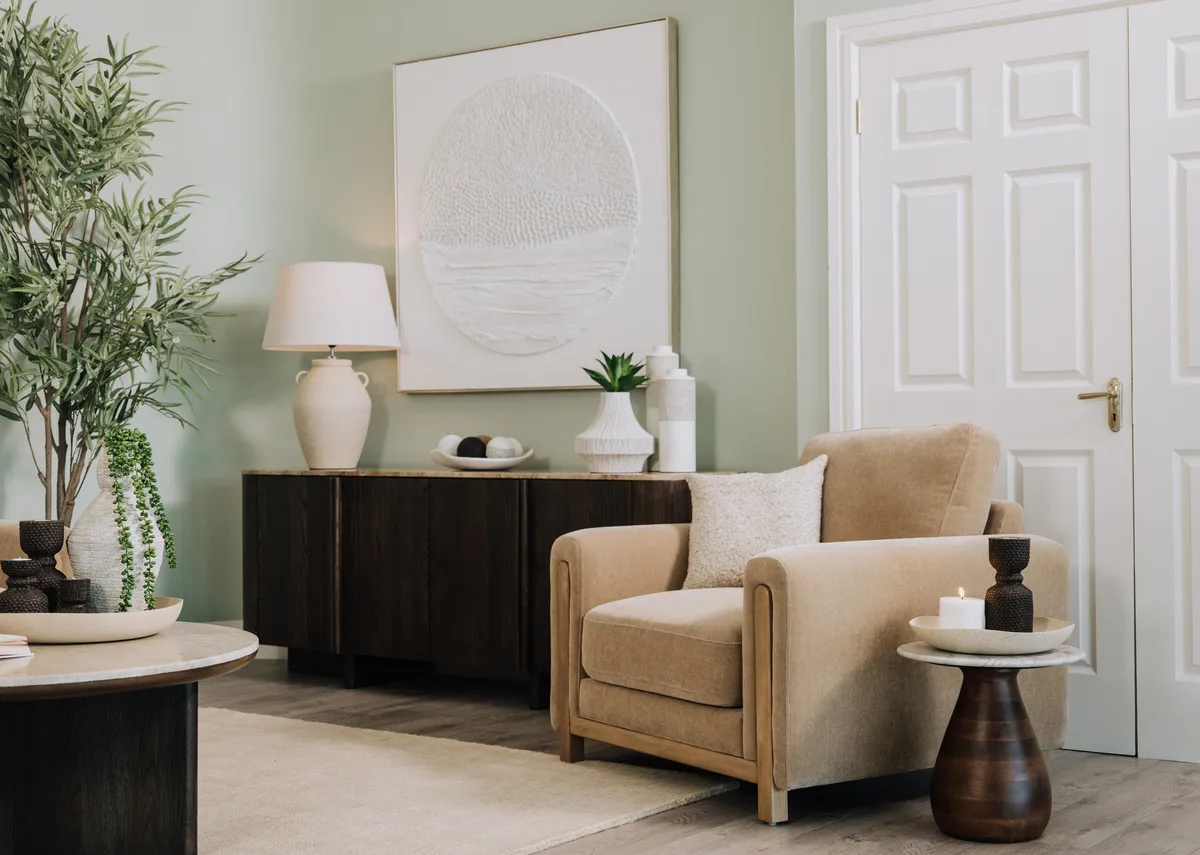 A lifestyle image of the Miller armchair with Ritz sideboard and coffee table