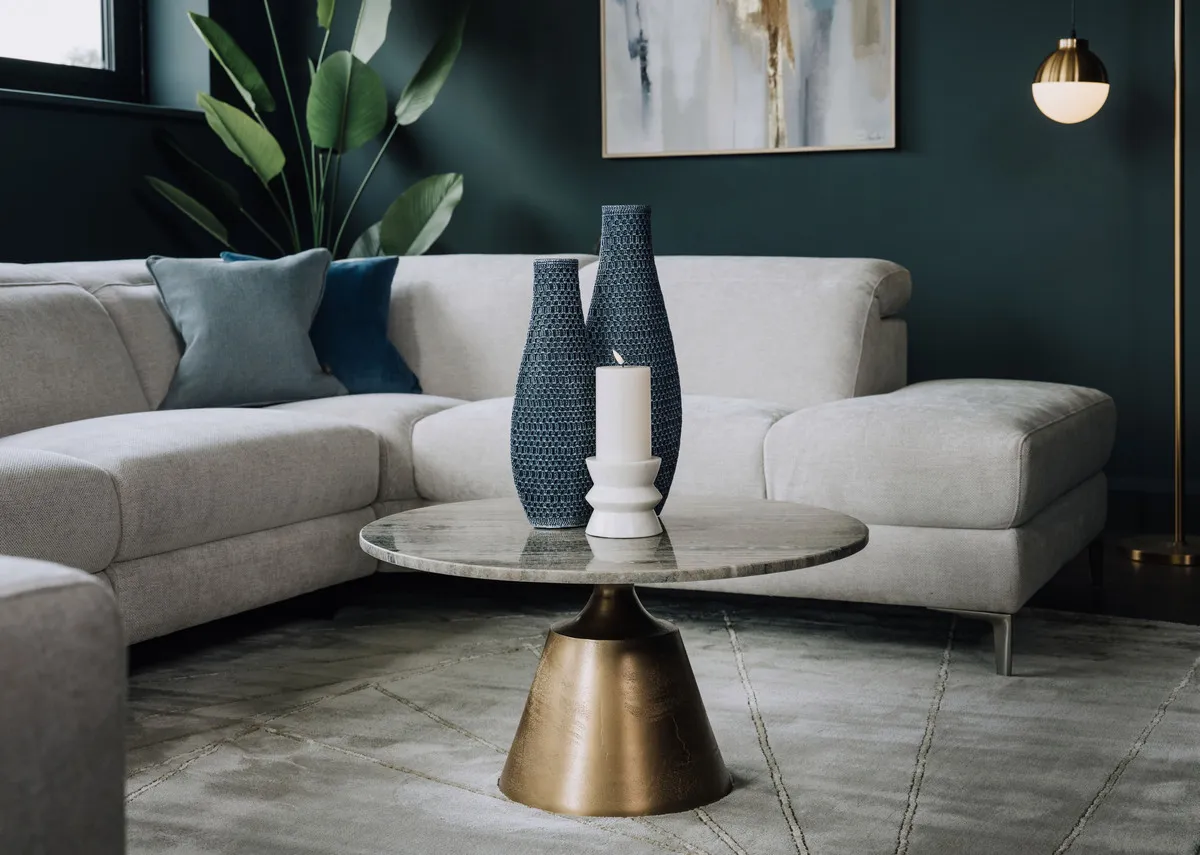 A lifetsyle image of the Pyramid coffee table with Vancouver sofa.