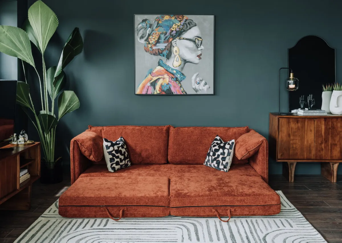 A lifestyle image of the Pierce sofa with Contessa 1 print and arc furniture