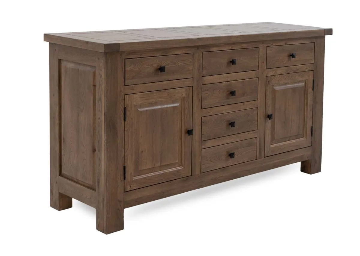 A 2 door and 6 drawer sideboard from EZ Livings Naxos range. Angled view of the metal stud handles.