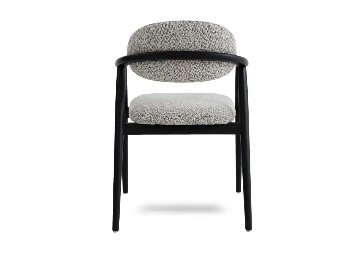 A black framed dining chair with grey boucle fabric from EZ Livings Rego range. Back view of frame
