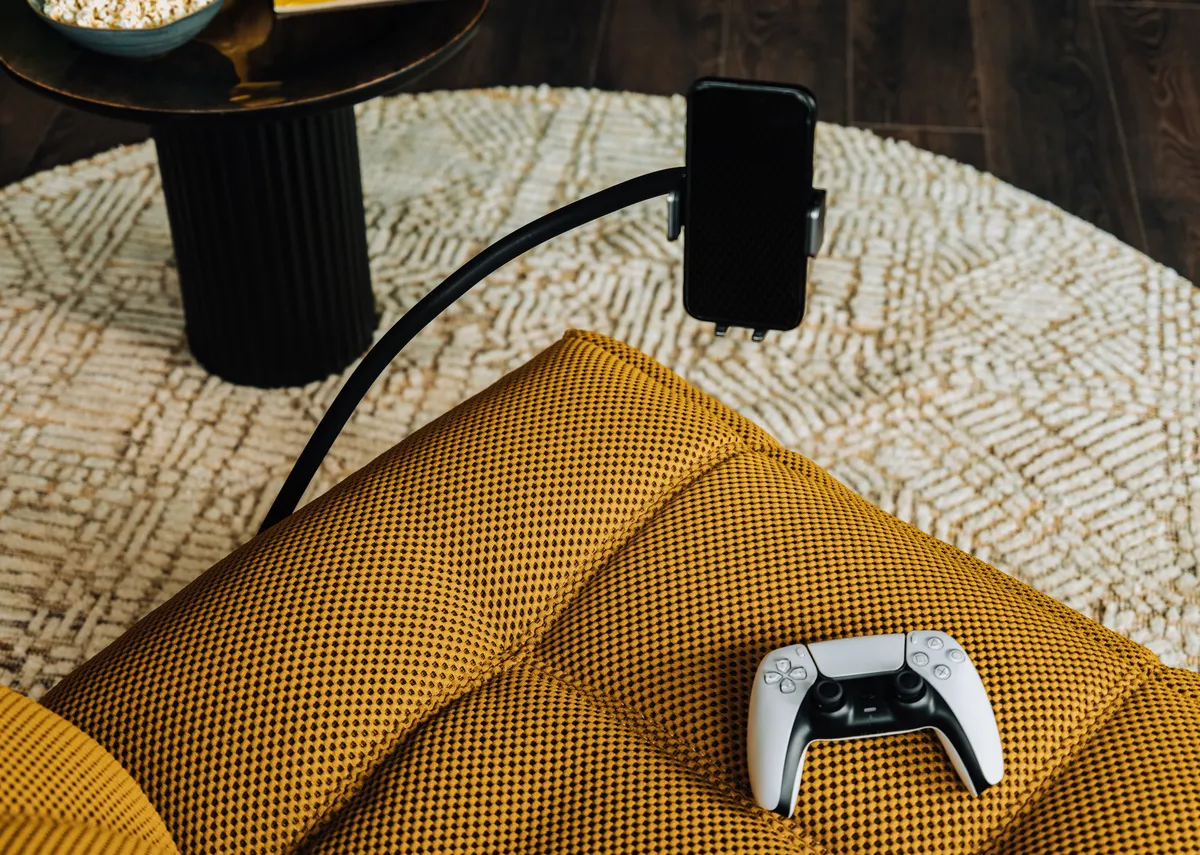 A closeup of the Jave recliner phone holder