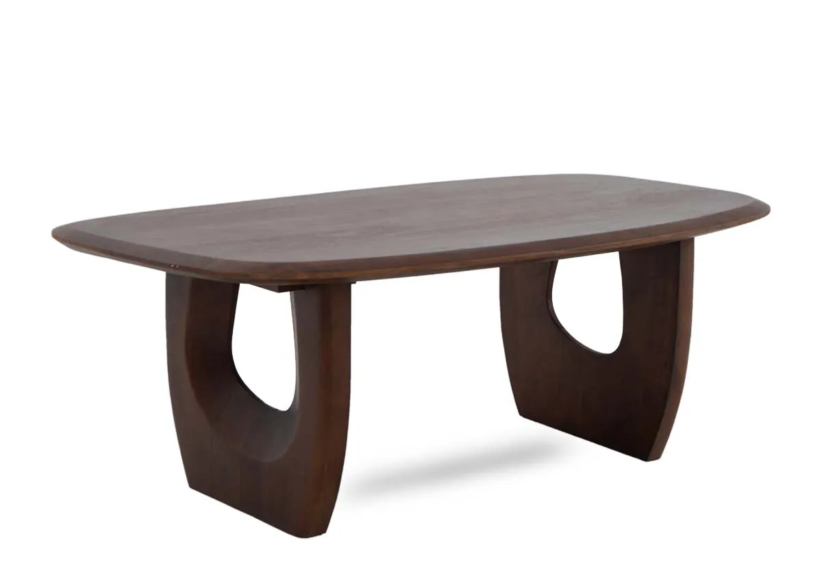 An oval rectangular coffee table with carved legs from EZ Livings Jet range. Angled view.