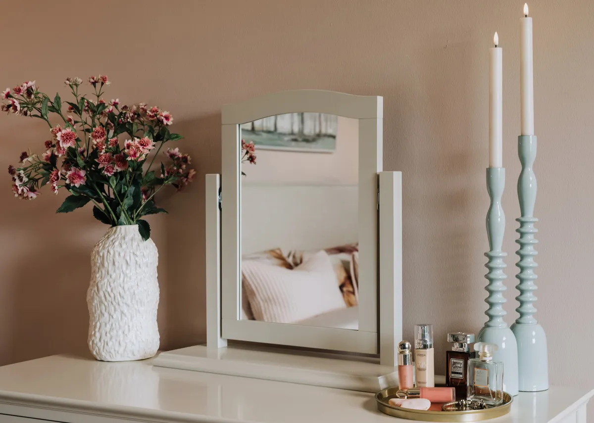 A lifestyle image of the Gloss collection including the Ridge candle holder in blue