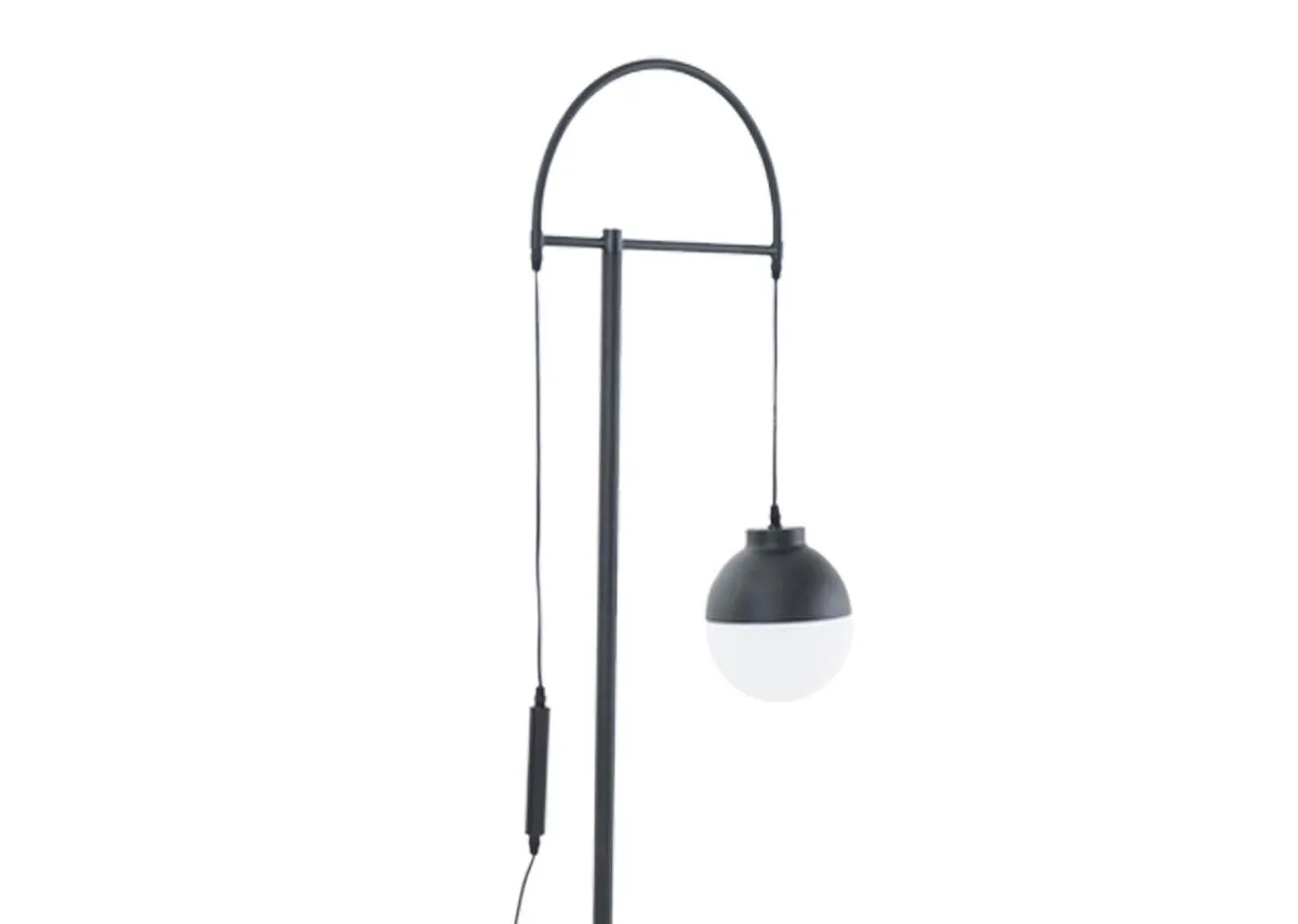 A black floor lamp from EZ Livings Casper range. Closeup of curved frame