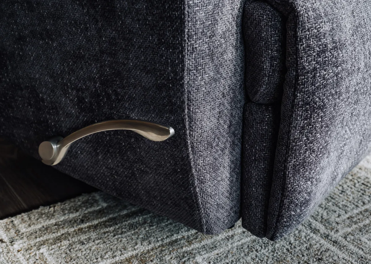 A silver fabric rocker swivel recliner from EZ Livings Mallow range. Side view fixed