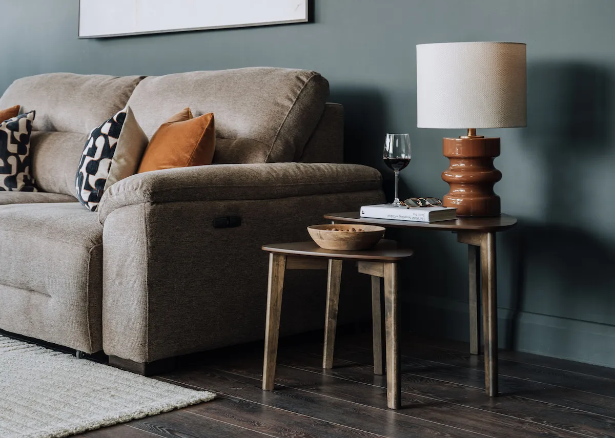 A lifestyle image of the Sonoma tables with the Annalee sofa and emmie lamp.
