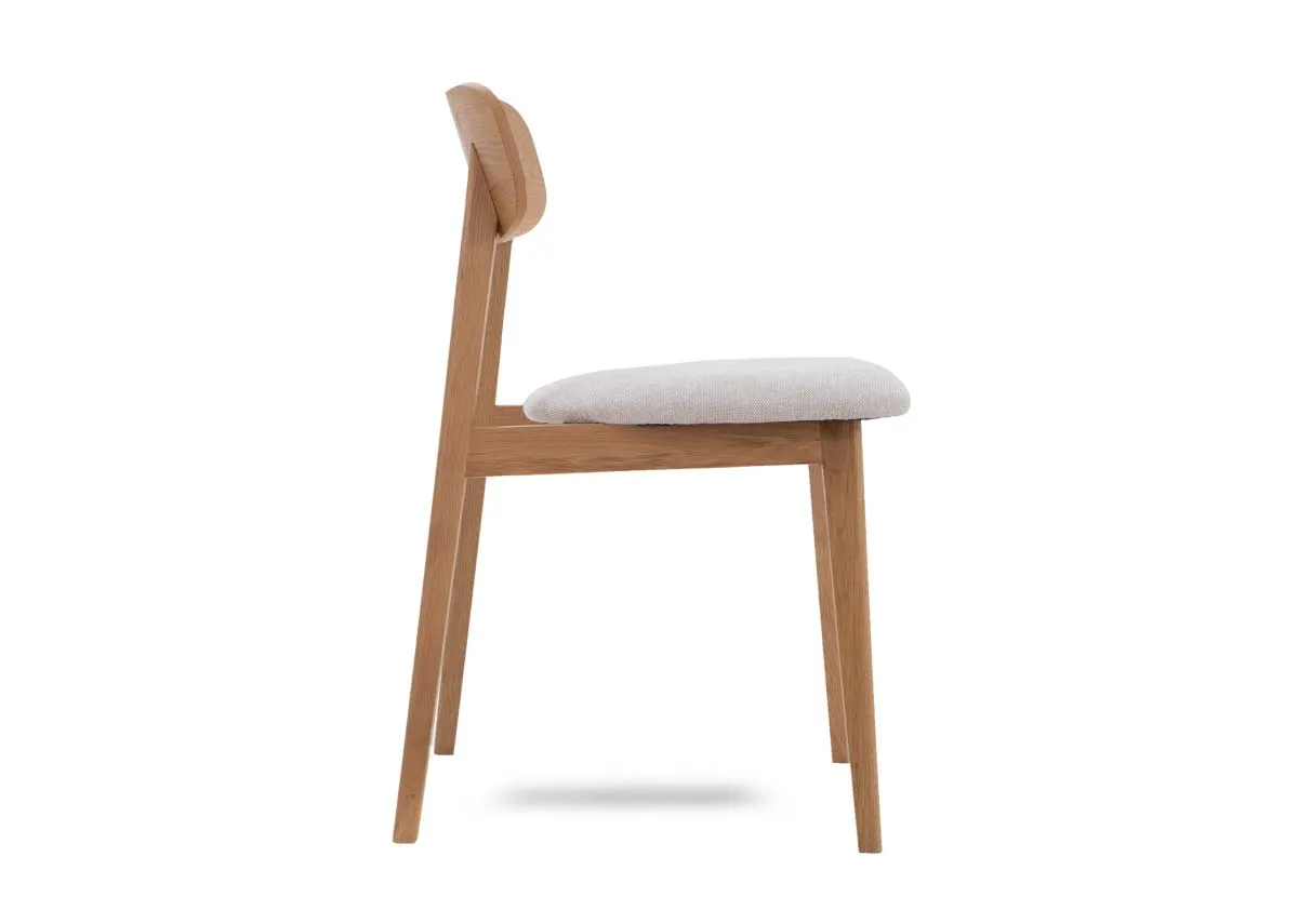 An oak dining chair with fabric seat from EZ Livings Hudson range.  Side view