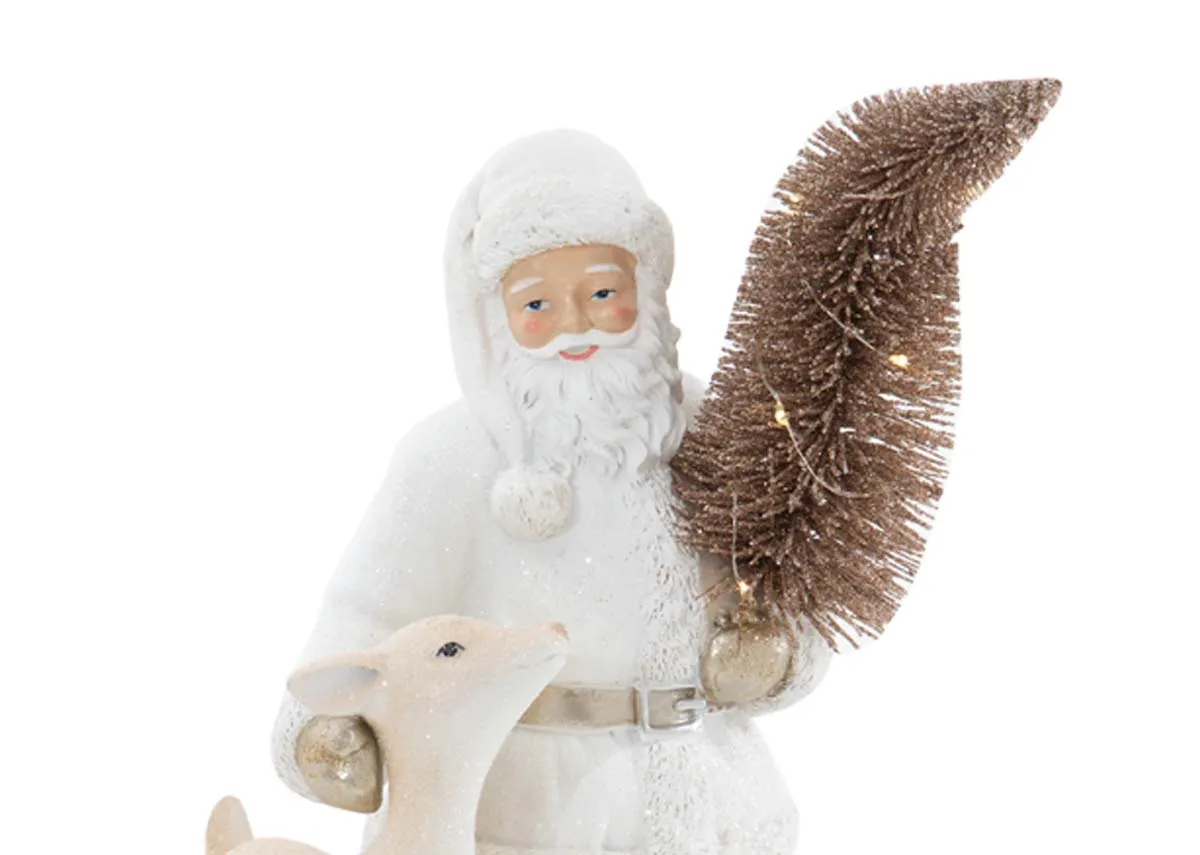  flow tables and a selection of ornaments including the Santa with Tree and deer.