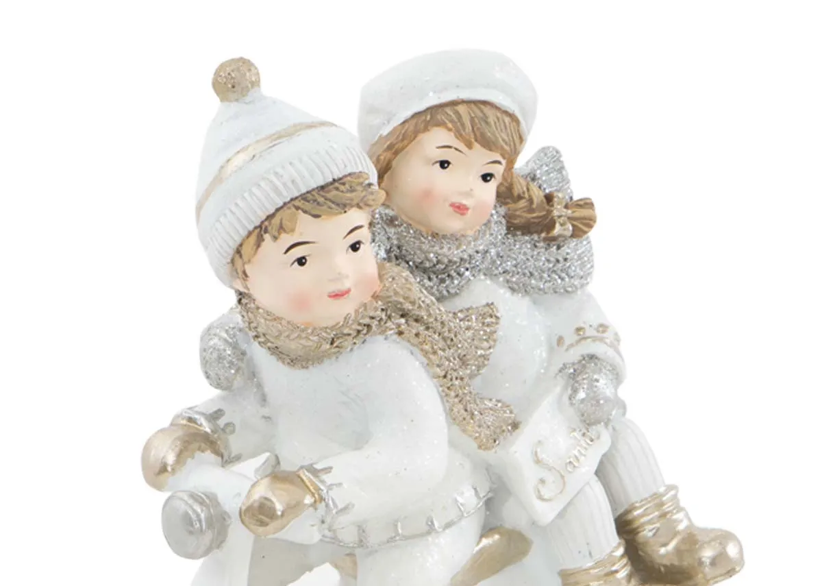 A dimension image of the Winter Kids on a scooter with 14.3cm x 14.2cm