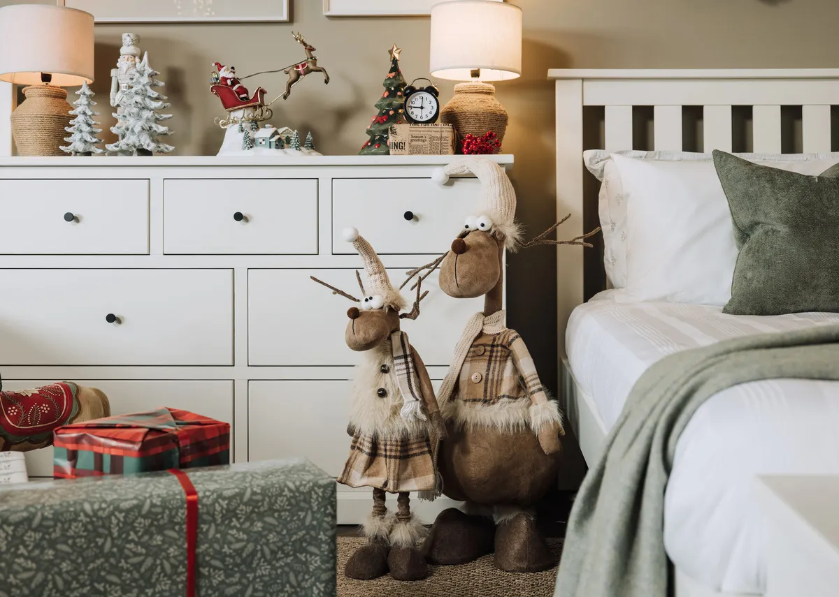 A lifestyle image of Charlie & Sprakles reindeer ornaments in a Atlas childrens bedroom.