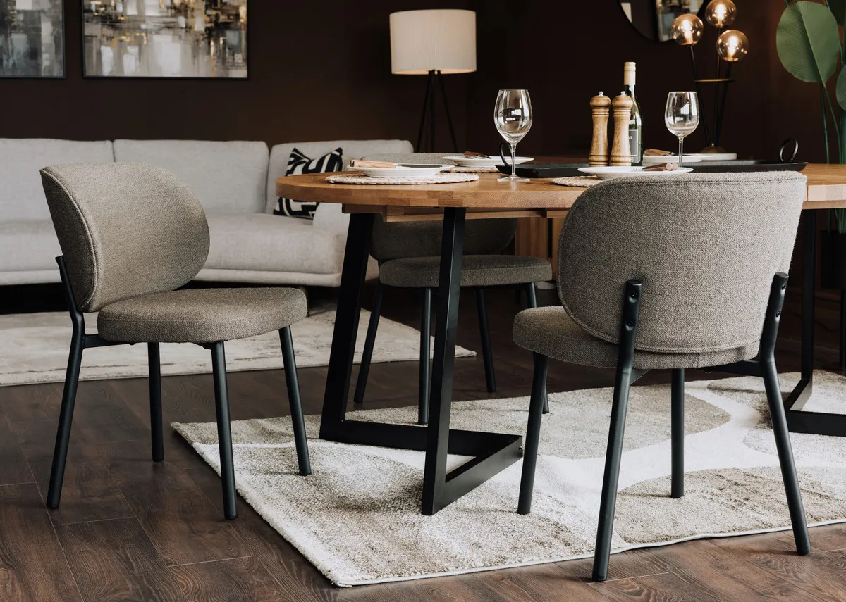 A lifestyle image of the Swan taupe chair with the renvyle