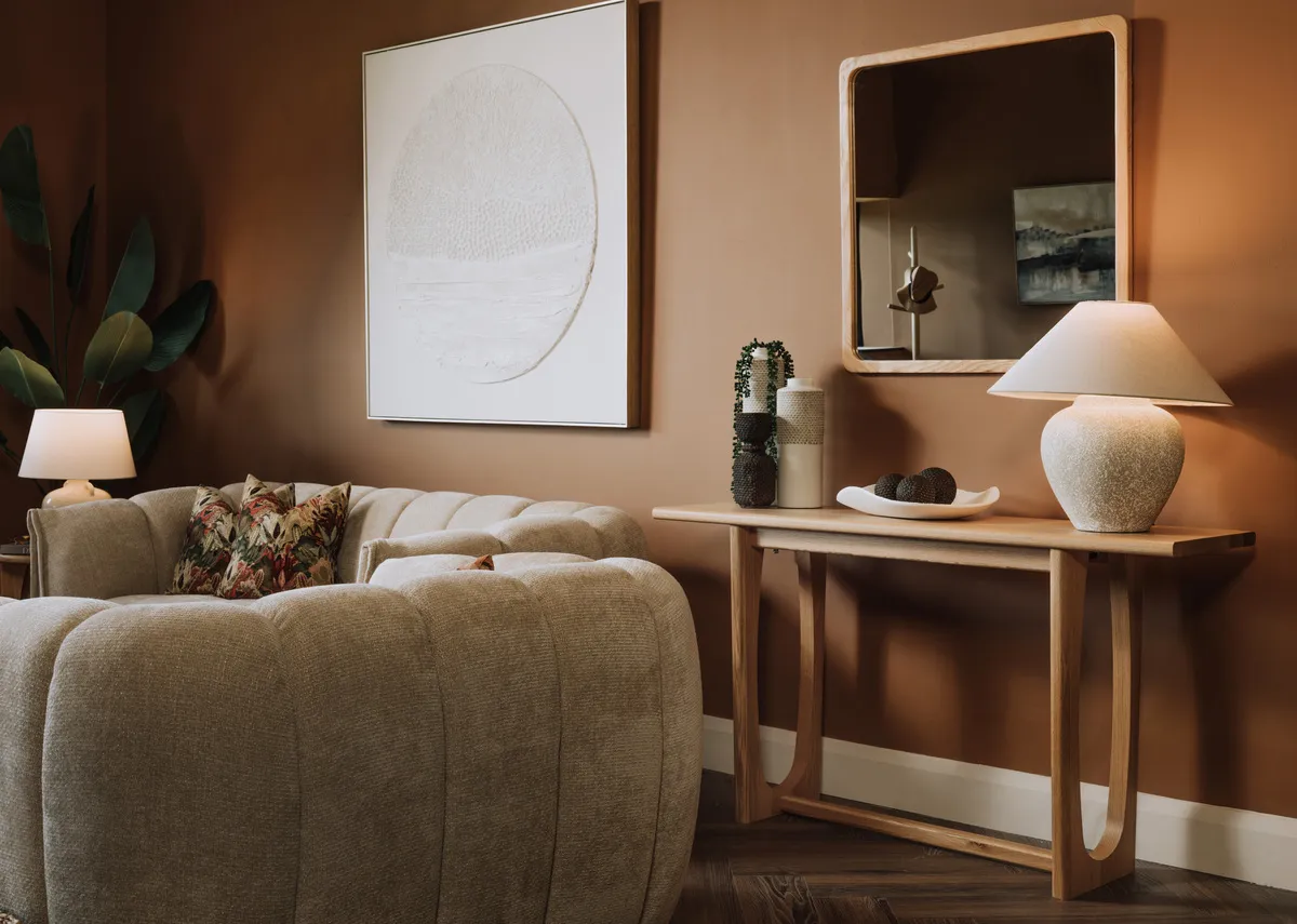 A lifetsyle image of the Flow natural console table with Charity mirror.
