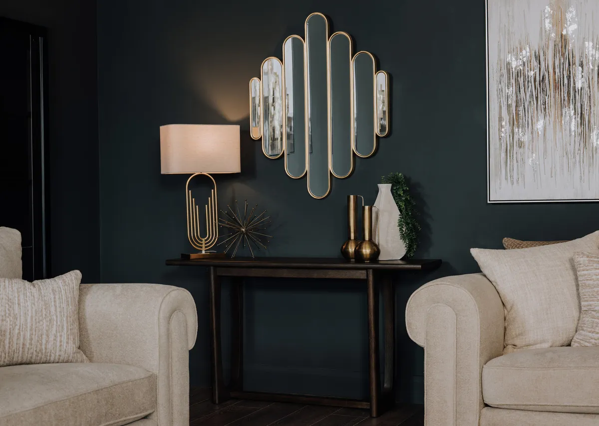 A lifetsyle image of the Flow espresso console table with art deco lamp and mirror