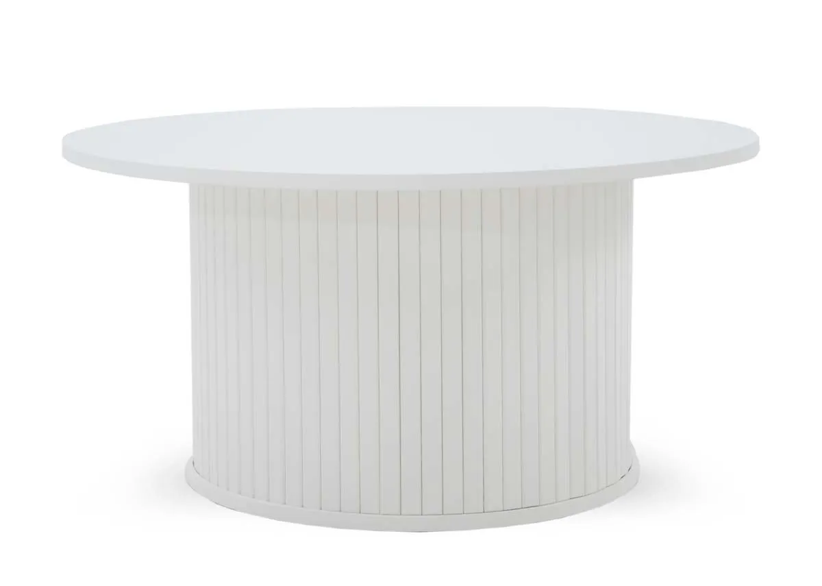 A white oak round coffee table with a cylindrical base featuring vertical slatted detailing. The tabletop is smooth and round.