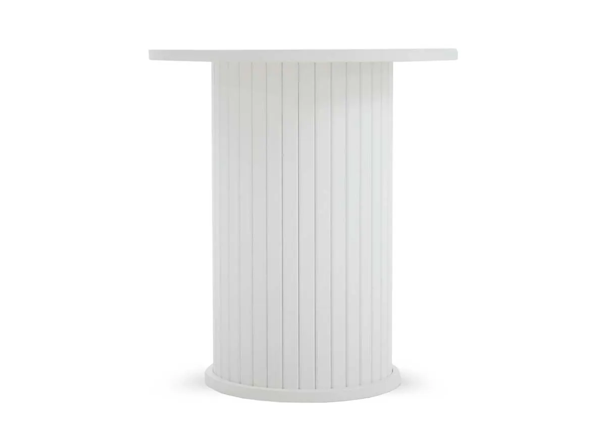 An angled view of the white round lamp table showcasing its smooth circular top and its textured fluted cylindrical base.