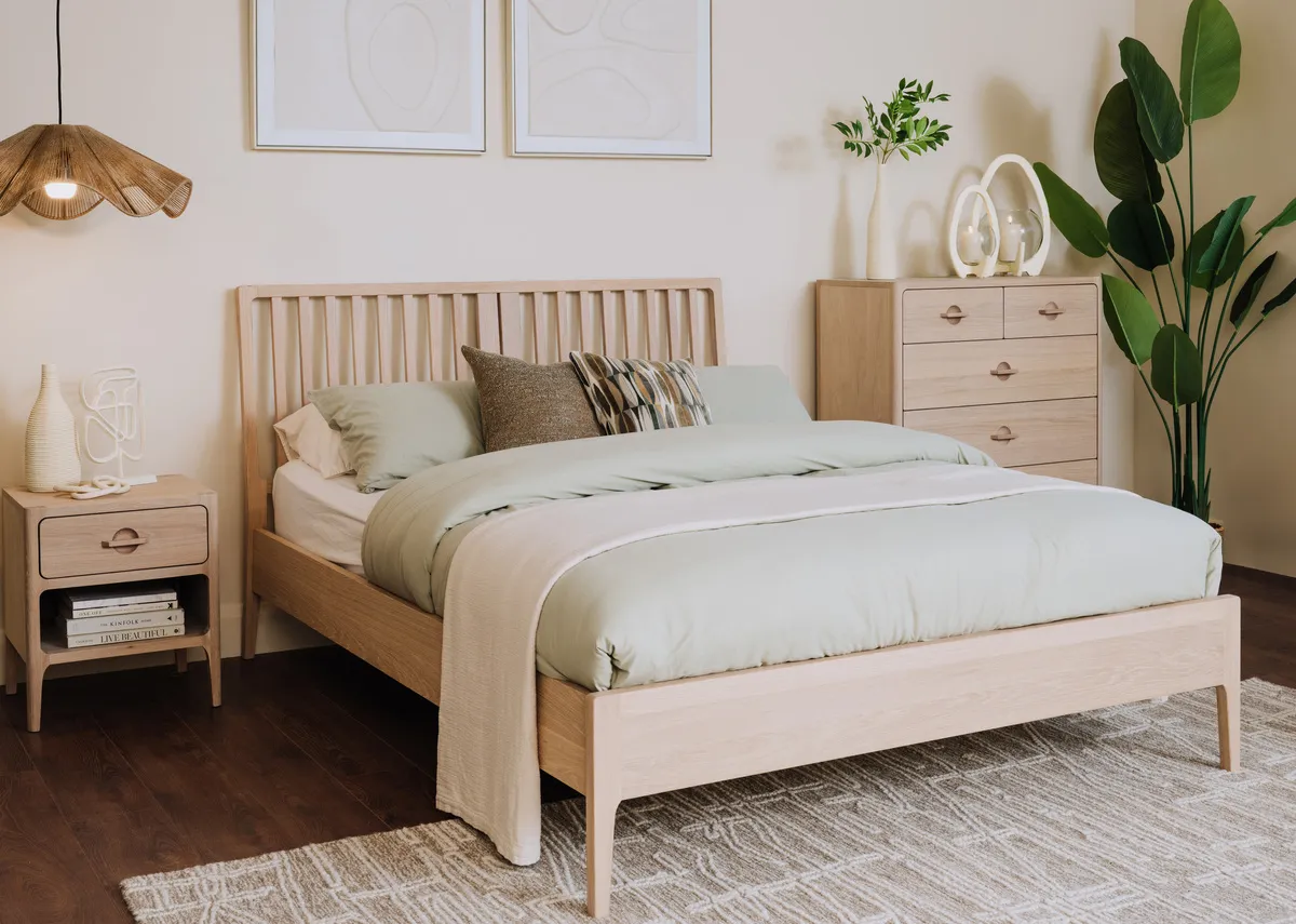 A lifestyle image of the Jay Bed with locker and chest and Gateway canvas pics.