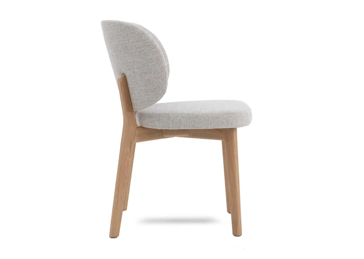 A taupe brown dining chair from EZ Livings Swan range. Side view