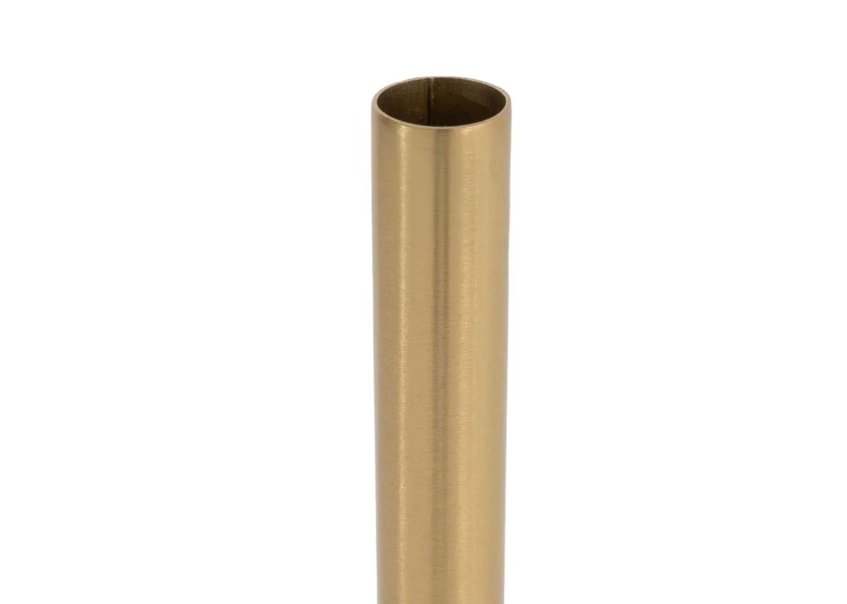 A gold metal candle stock holder with a closeup on the tube shaped holder.