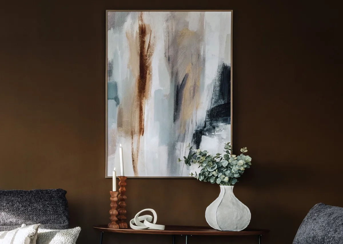 A lifestyle image of the Inspired Canvas with Moonlight candle holders