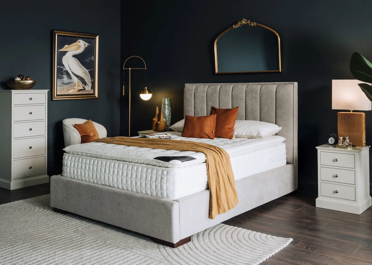 A lifestyle image of the Legacy firm mattress with Liberty bed ad Pelican picture.