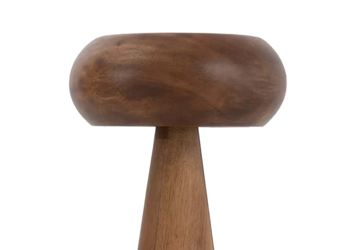 A mushroom shaped table lamp crafted from wood. Closeup of wood shade