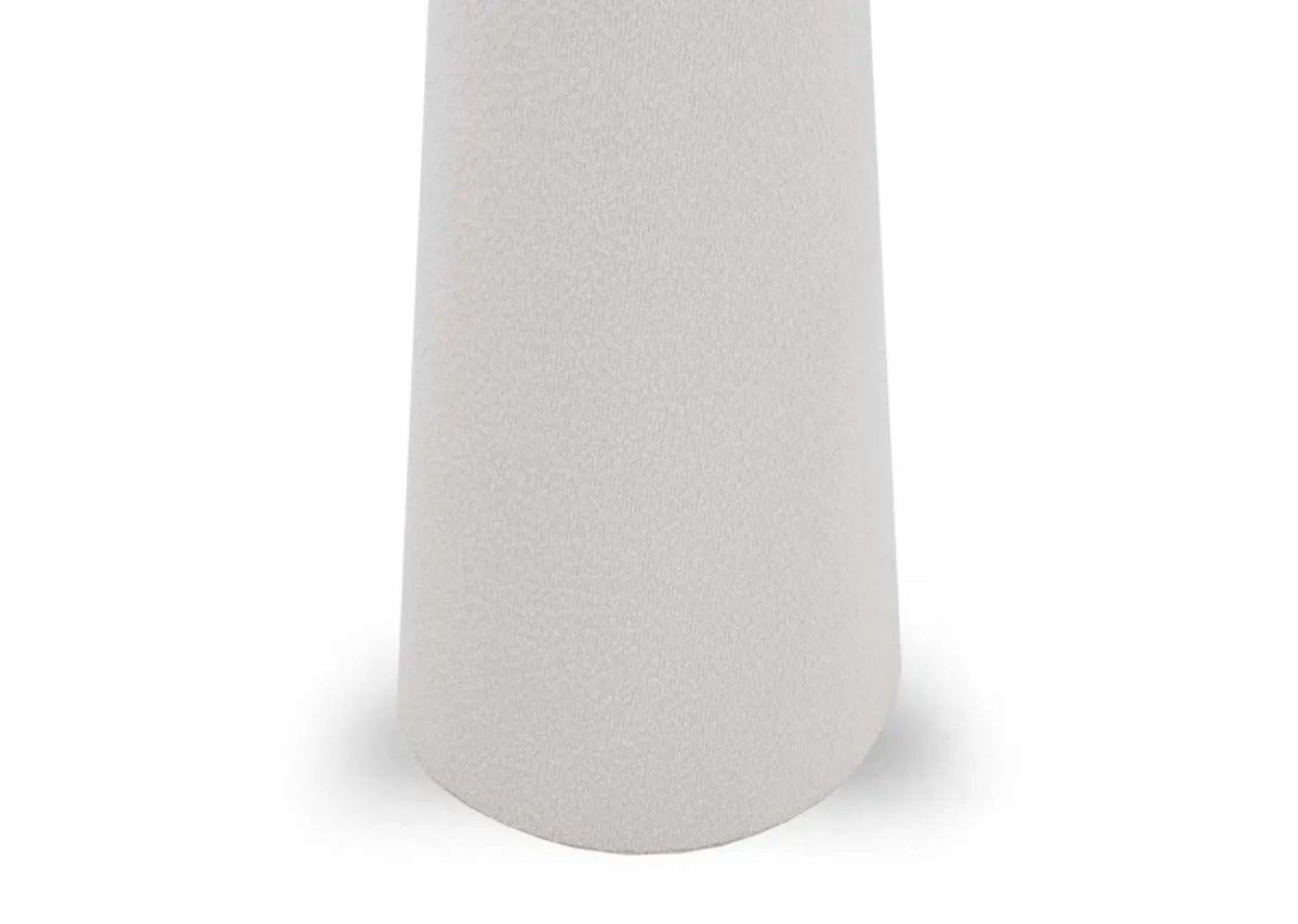A white floor lamp with boucle shade from EZ Livings Tullow range.Closeup of white pole base.