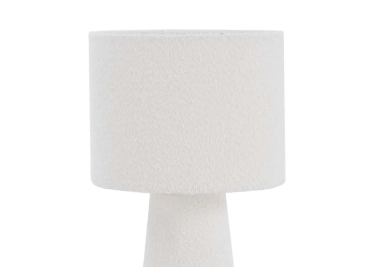 A white table lamp with boucle shade from EZ Livings Tullow range. Closeup of shade