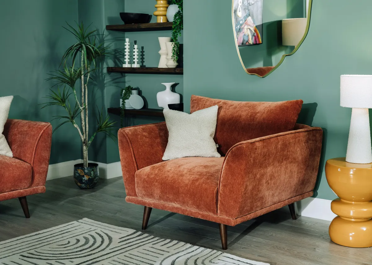 A lifestyle image of the Boutique cuddler with tullow table lamp.