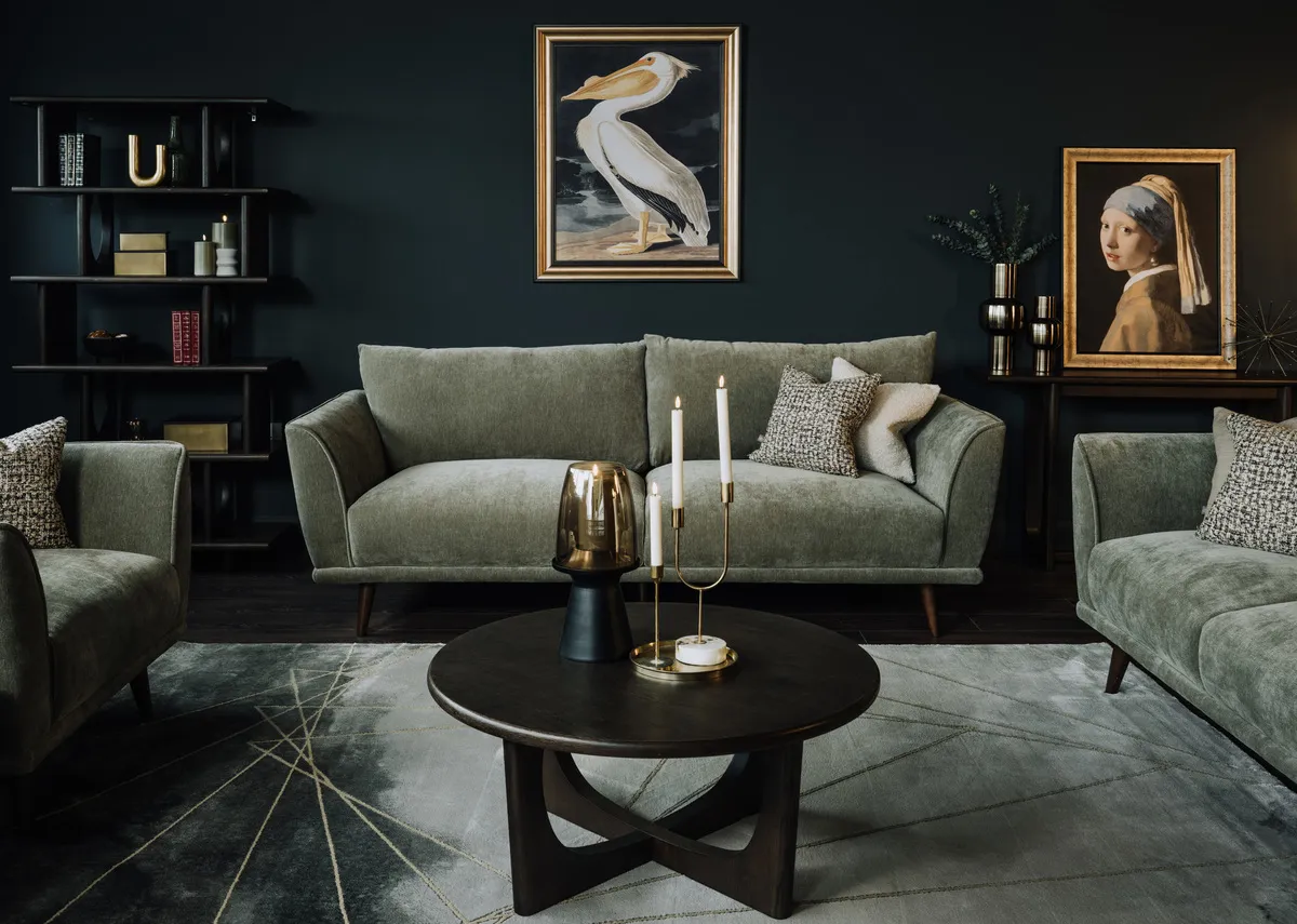 A lifestyle image of the Boutique sofa range with Flow table and Pelican and Girl with a pearl canvas