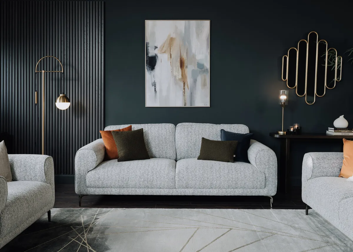 A lifestyle image of the Oyster 3 seater sofa with Inspired canvas and casper lamp.