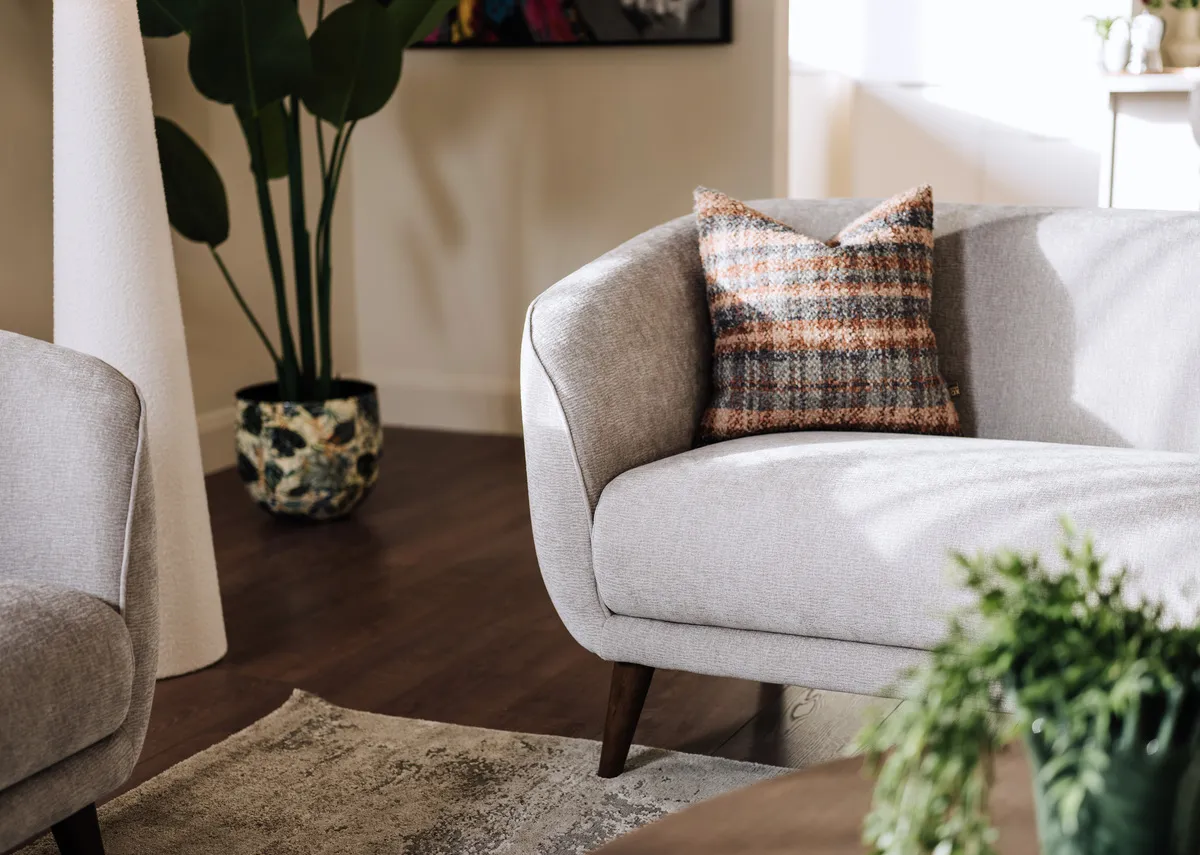 A dimension image of the Amber Silver Sofa with 205cm x 84cm x 77cm