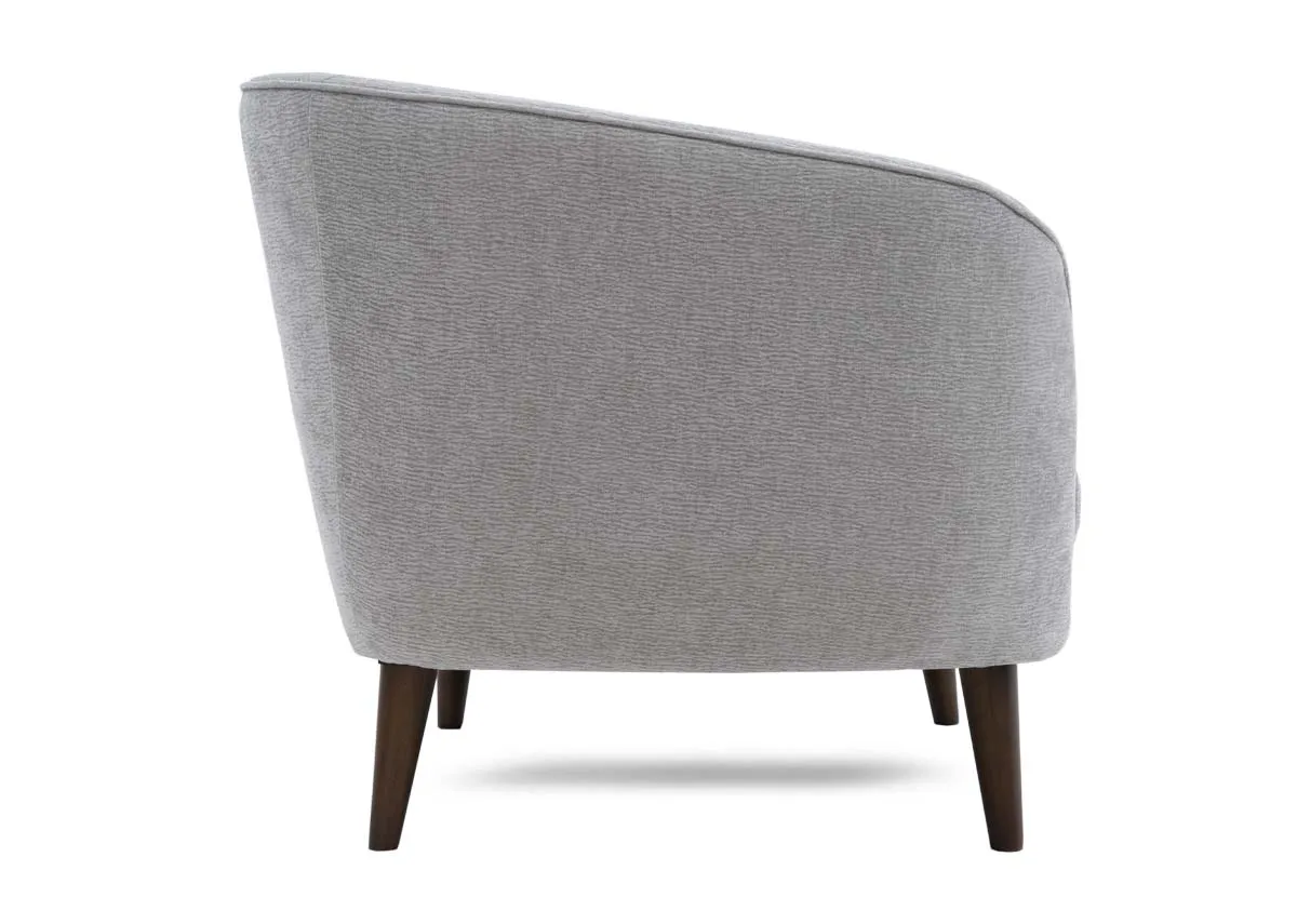 A silver armchair from EZ Livings Amber range. Side view