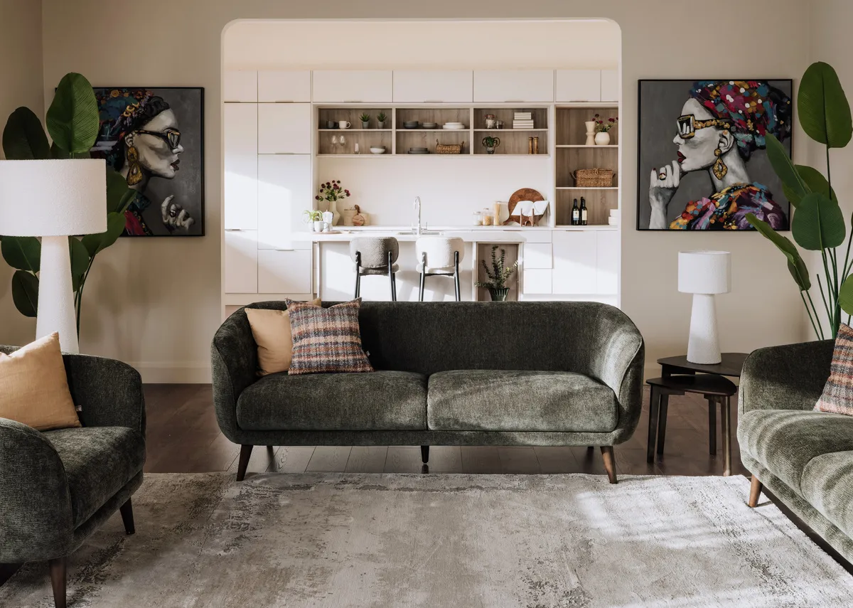 A lifestyle image of the Amber 3 seater sofa with armchair with Tolka lamp and Contessa Canvas