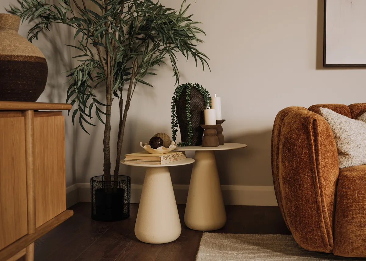 A lifetsyle image of the Atrani candle hodlers with Teo tables