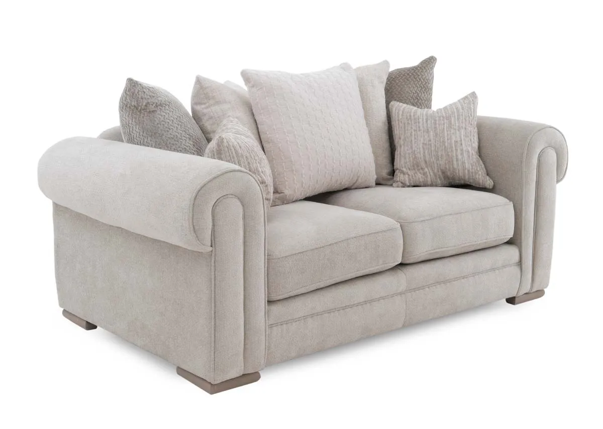 A 2 seater cream pillowback sofa from EZ Livings Olivia range. Angled view.
