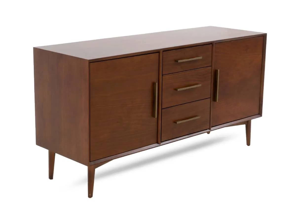 An angled view of a dark pine sideboard with two doors and three central drawers all with sleek brass pull handles.